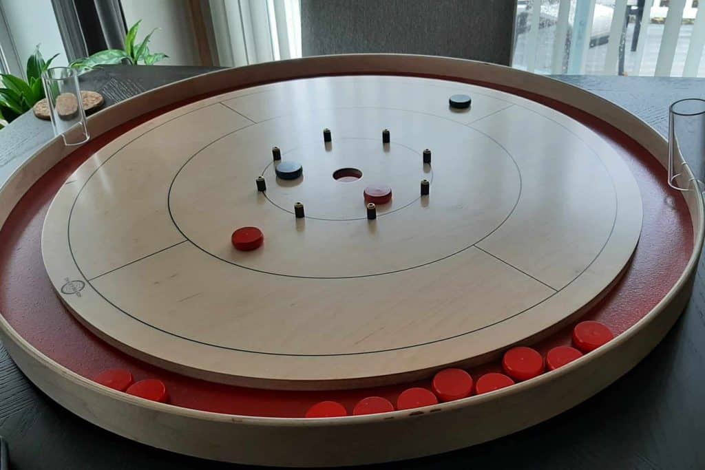 A set of 20 holders on a red Tracey Board